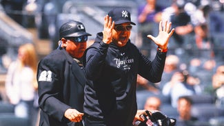 Next Story Image: Yankees' Aaron Boone ejected five pitches into game vs. A's after fan outburst